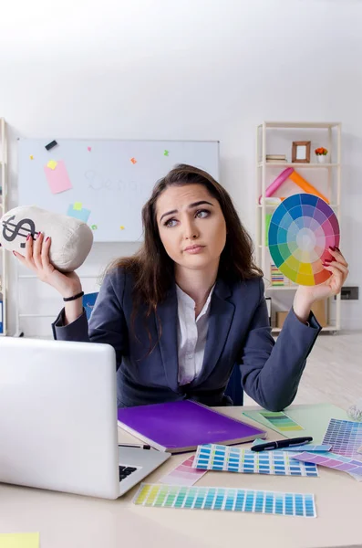 Young female designer working in the office — Stock Photo, Image