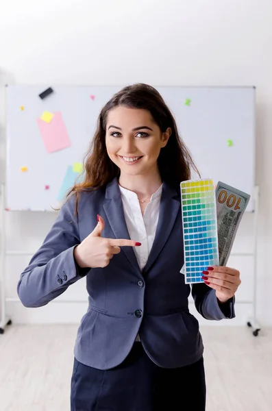 Young female designer working in the office — Stock Photo, Image