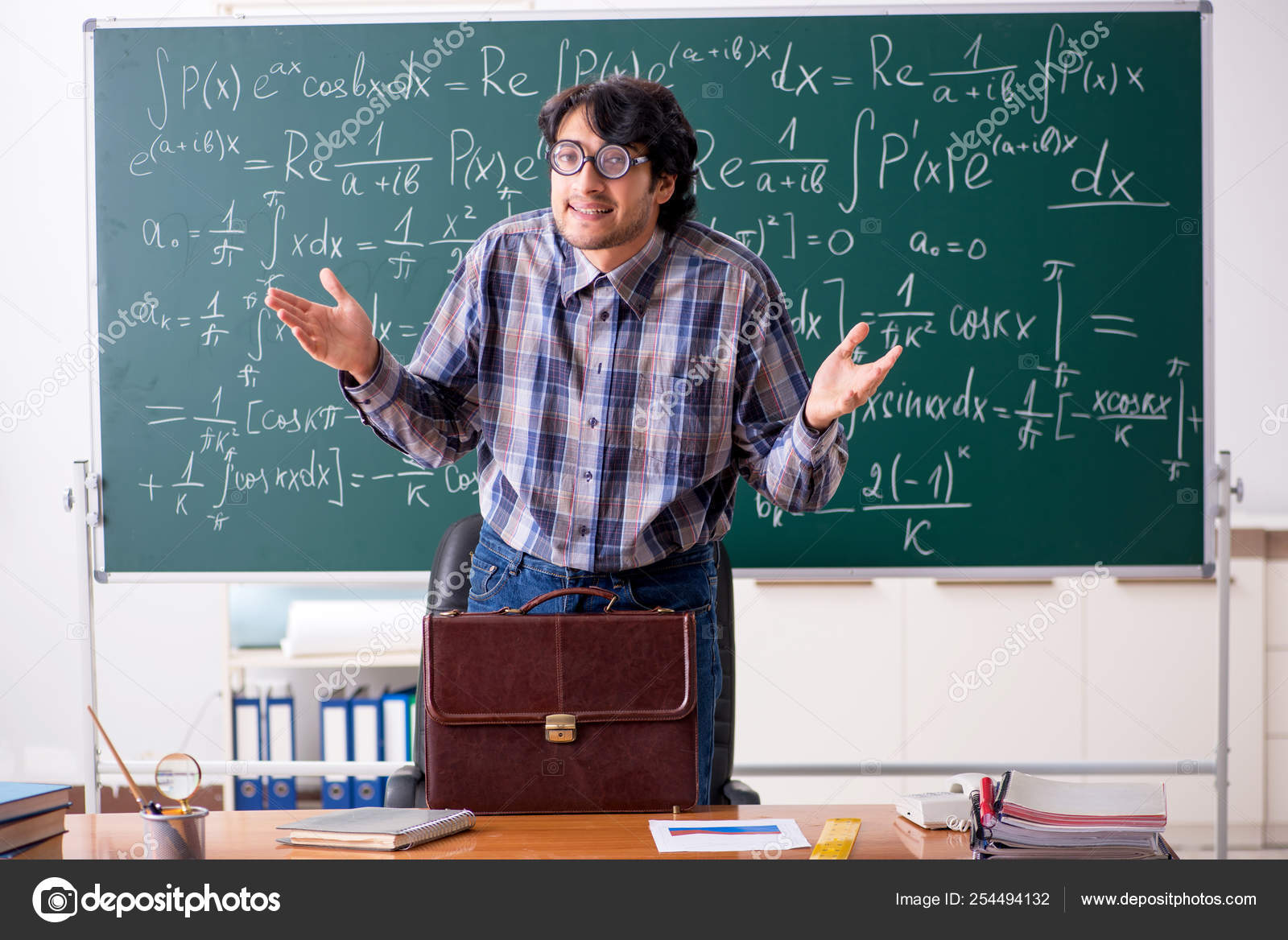 Funny male math teacher in the classroom Stock Photo by ©Elnur_ ...