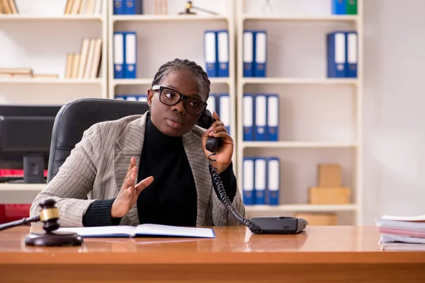 Black female lawyer in courthouse