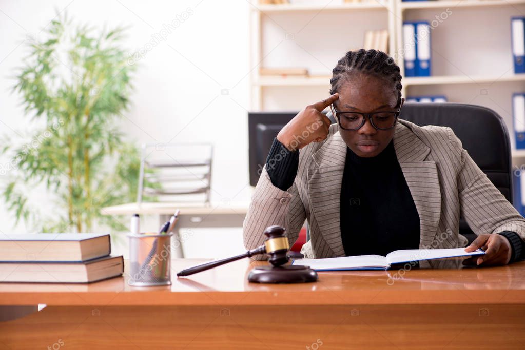 Black female lawyer in courthouse 
