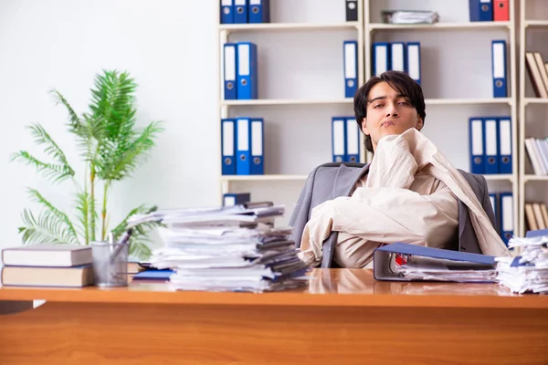 Crazy young man in straitjacket at the office — Stock Photo, Image
