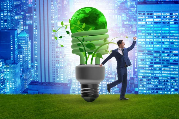 Concept van energie-efficiëntie met gloeilamp — Stockfoto