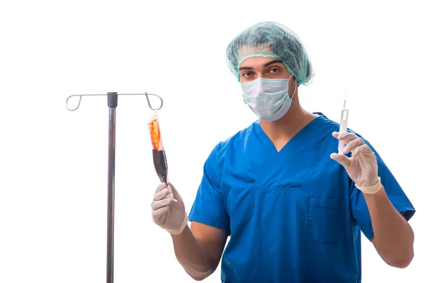 Jonge dokter in infusie concept geïsoleerd op wit — Stockfoto