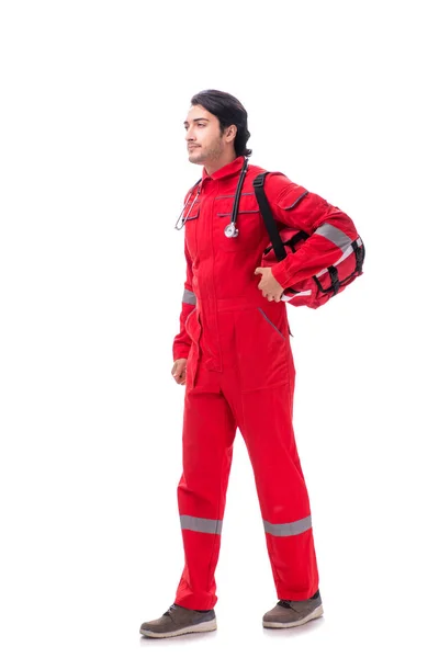 Jovem paramédico de uniforme vermelho isolado sobre branco — Fotografia de Stock