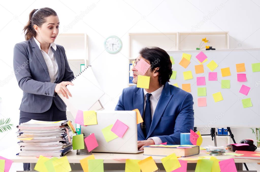 Two colleagues employees working in the office 