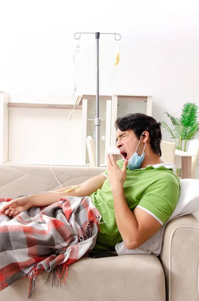 Young man suffering at home — Stock Photo, Image