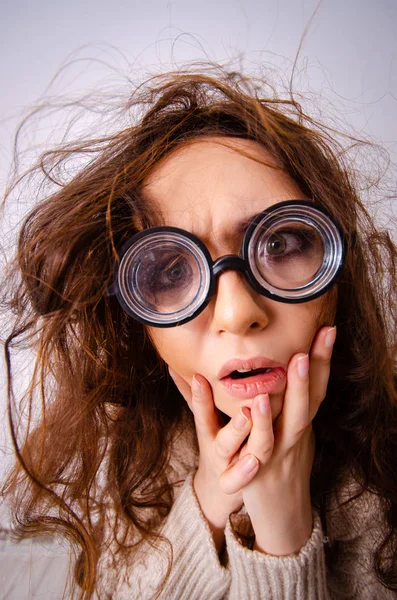 Funny nerd girl working on computer — Stock Photo, Image