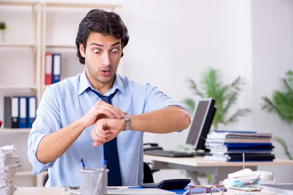 Young male businessman employee unhappy with excessive work — Stock Photo, Image