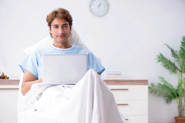 Young male patient lying on couch in hospital