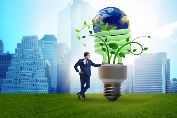 Concept van energie-efficiëntie met gloeilamp — Stockfoto