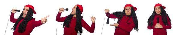 Jeune homme avec microphone isolé sur blanc — Photo