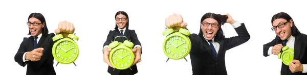 Hombre de negocios guapo sosteniendo reloj despertador aislado en blanco — Foto de Stock