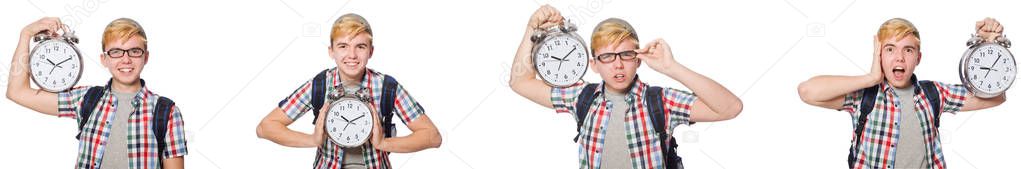 Young boy with alarm-clock in time management concept 