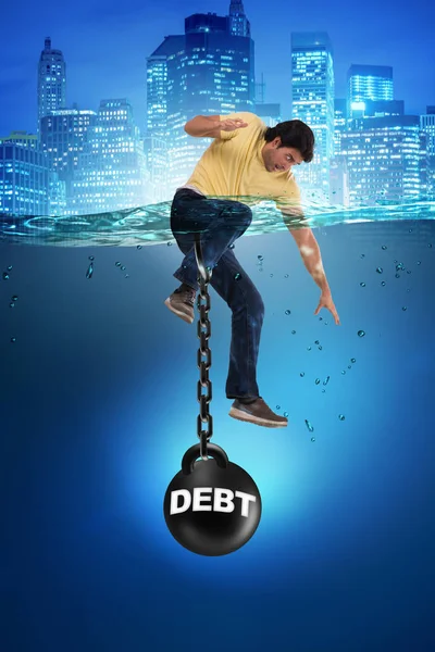 Młody student w koncepcji kredytu i długu — Zdjęcie stockowe