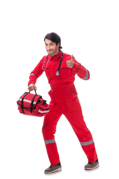 Young paramedic in red uniform isolated on white — Stock Photo, Image