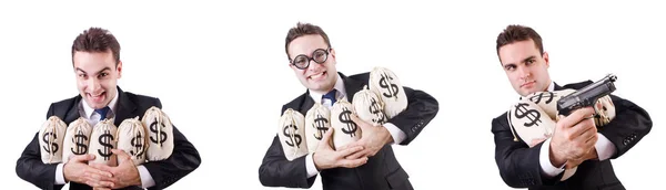 Businessman with money sacks and handgun — Stock Photo, Image