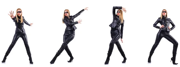 Dancing woman in black leather costume — Stock Photo, Image