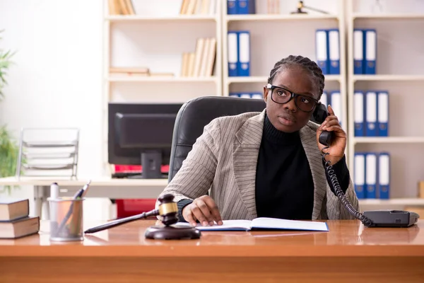 Black female lawyer in courthouse