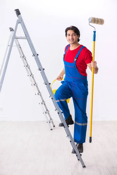 Young handsome contractor working indoors — Stock Photo, Image