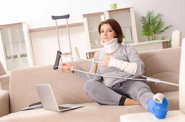 Woman after car accident suffering at home Stock Photo