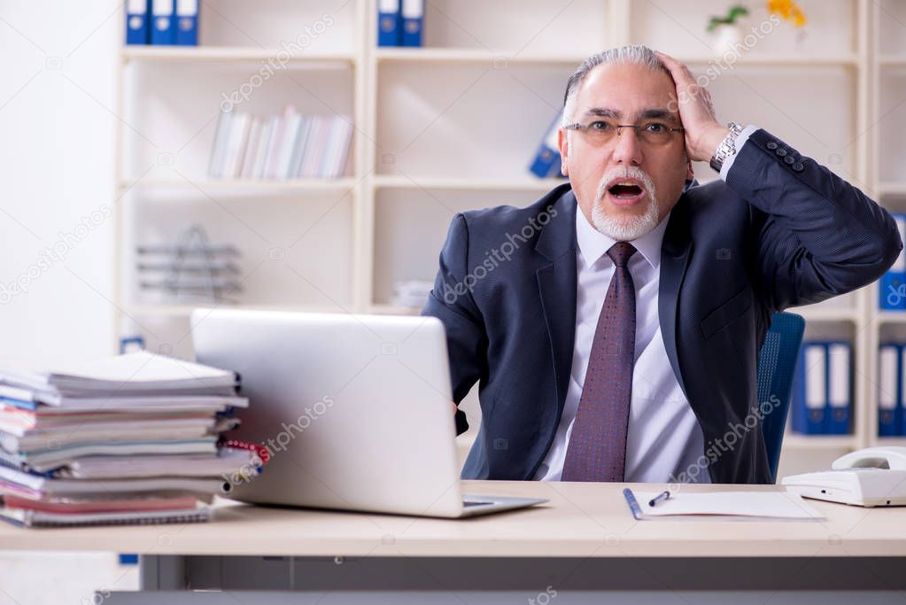White bearded old businessman employee unhappy with excessive wo