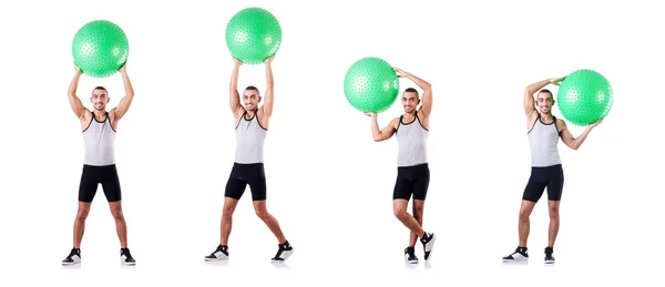 Hombre con pelota suiza haciendo ejercicios en blanco —  Fotos de Stock