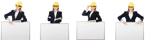 Young female builder with whiteboard — Stock Photo, Image