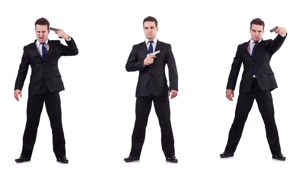 Hombre de traje con pistola aislada en blanco —  Fotos de Stock