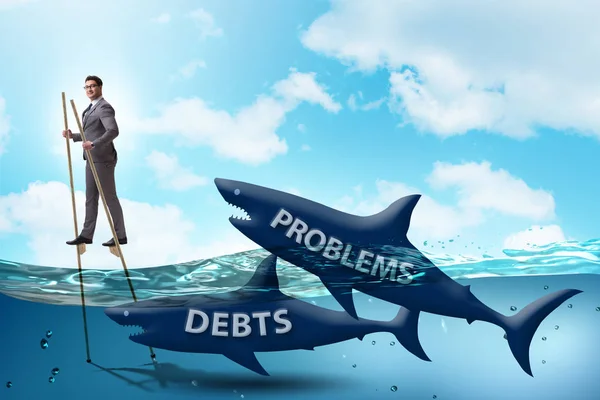Zakenman succesvol omgaan met leningen en schulden — Stockfoto