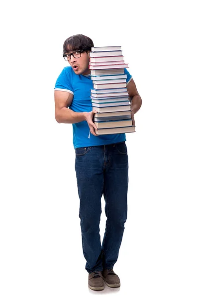 Mannelijke student met veel boeken geïsoleerd op wit — Stockfoto