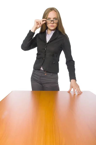 Empregada feminina sentada em mesa longa isolada em branco — Fotografia de Stock