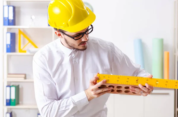 Young male architect working in the office — Stock Photo, Image