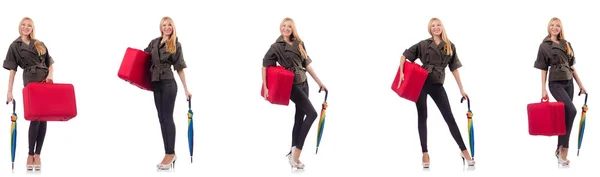 Junge schöne Frau mit Koffer und Regenschirm isoliert auf whi — Stockfoto