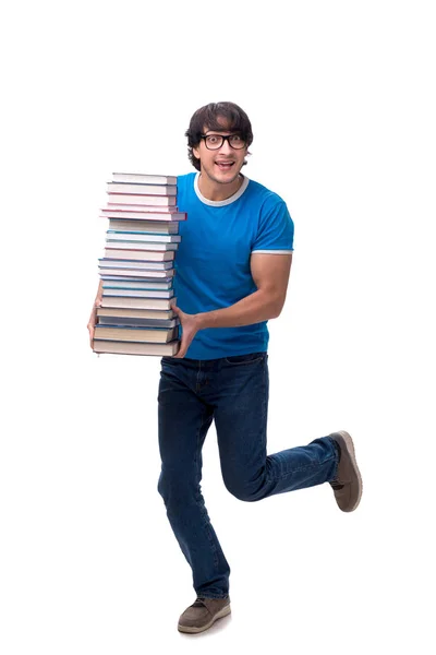 Estudante do sexo masculino com muitos livros isolados em branco — Fotografia de Stock