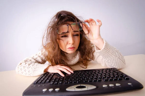 Funny nerd girl working on computer — Stock Photo, Image