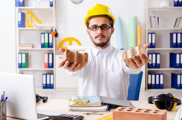 Young male architect working in the office — Stock Photo, Image