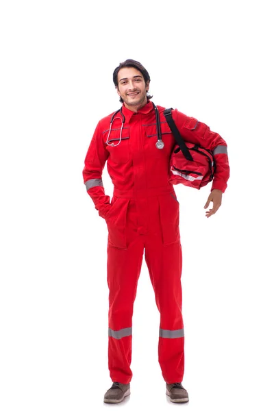 Ung sjukvårdare i röd uniform isolerad på vit — Stockfoto