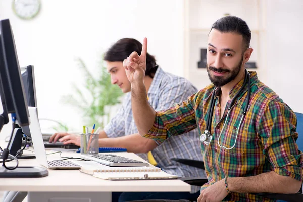 IT engineers working on hardware issue