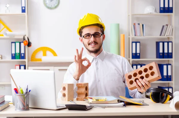 Young male architect working in the office — Stock Photo, Image