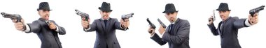 Tabanca ile takım elbiseli Genç gangster 