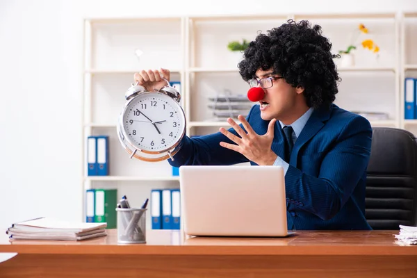 Young clown businessman working in the office — Stock Photo, Image