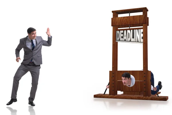 Zakenman in deadline concept met guillotine — Stockfoto