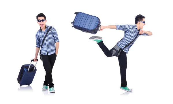Młody facet z walizką podróżną na białym — Zdjęcie stockowe