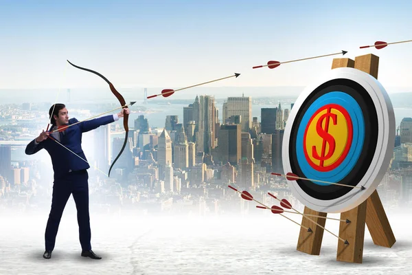 Businessman aiming arrow with bow — Stock Photo, Image