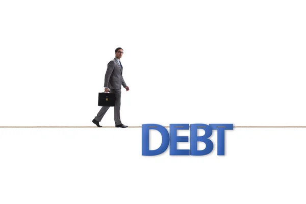 Debt and loan concept with businessman walking on tight rope — Stock Photo, Image