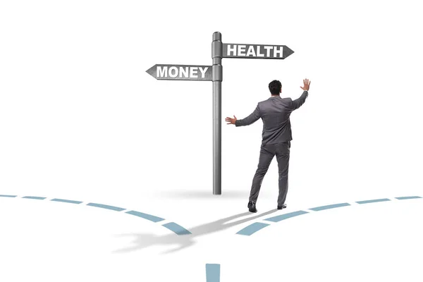 Businessman choosing between money and health — Stock Photo, Image