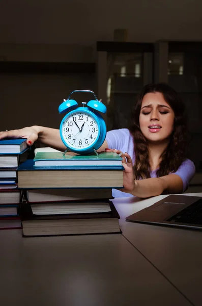 Young female student preparing for exams late at home — Stock Photo, Image