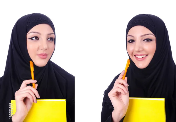 Mujer musulmana joven con libro sobre blanco —  Fotos de Stock