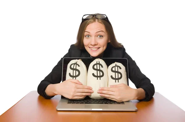 Vrouwelijke werknemer met geldzakken op haar tafel — Stockfoto